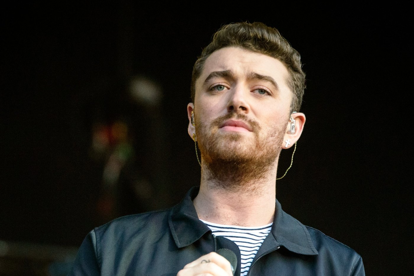 Sam Smith singing on stage at Lollapalooza in 2015